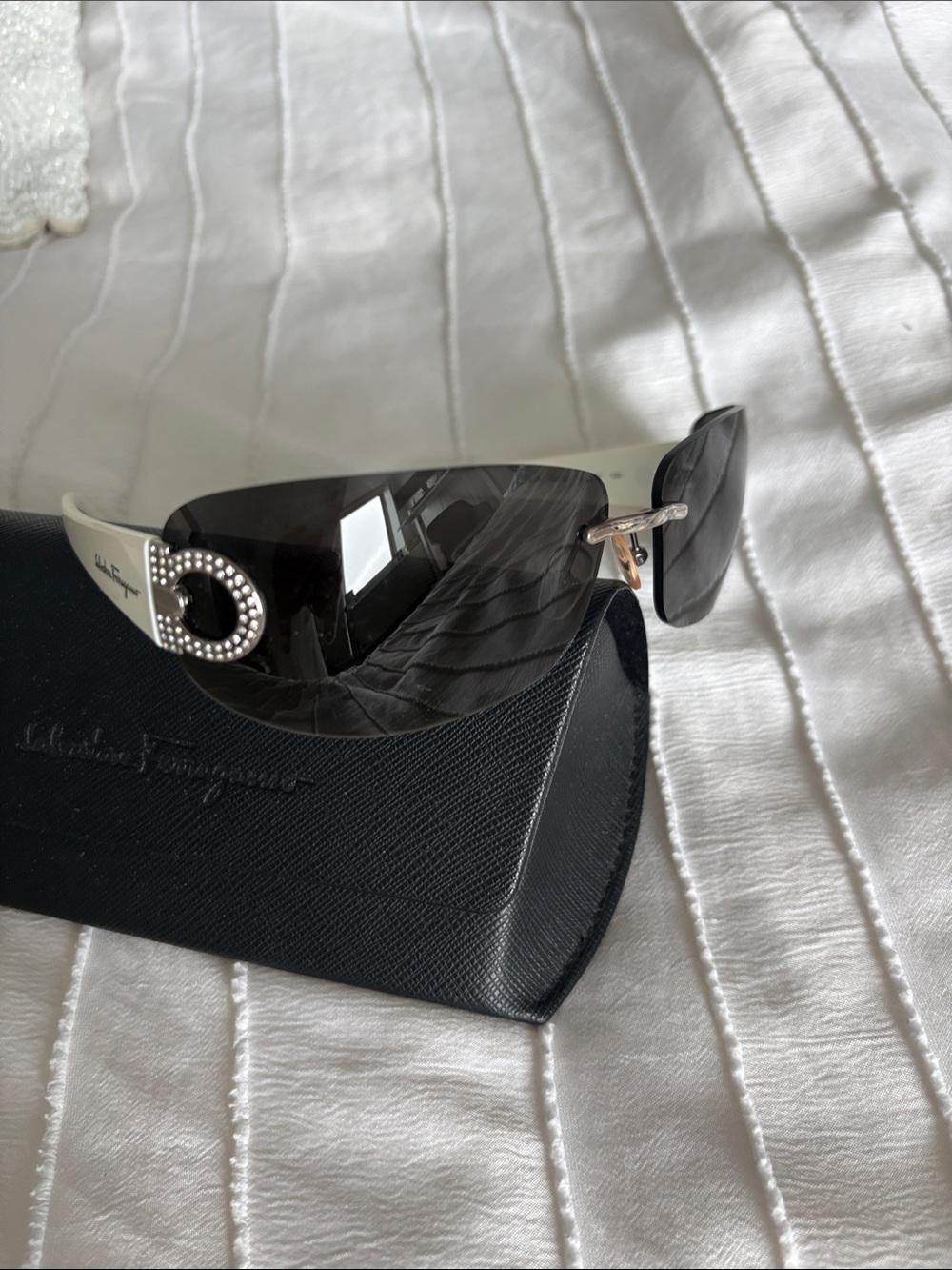Salvatore Ferragamo women’s Gray Rimless Sunglasses with Silver Accents